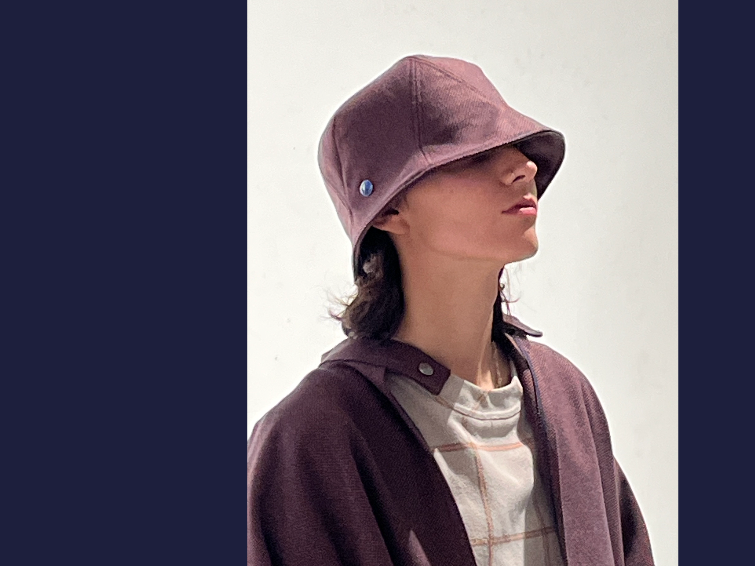 Lola is wearing a Le Panache Paris© bucket hat N°119 made in France with Parcel Loop fabric from Gabriel © 100% recyclable polyester